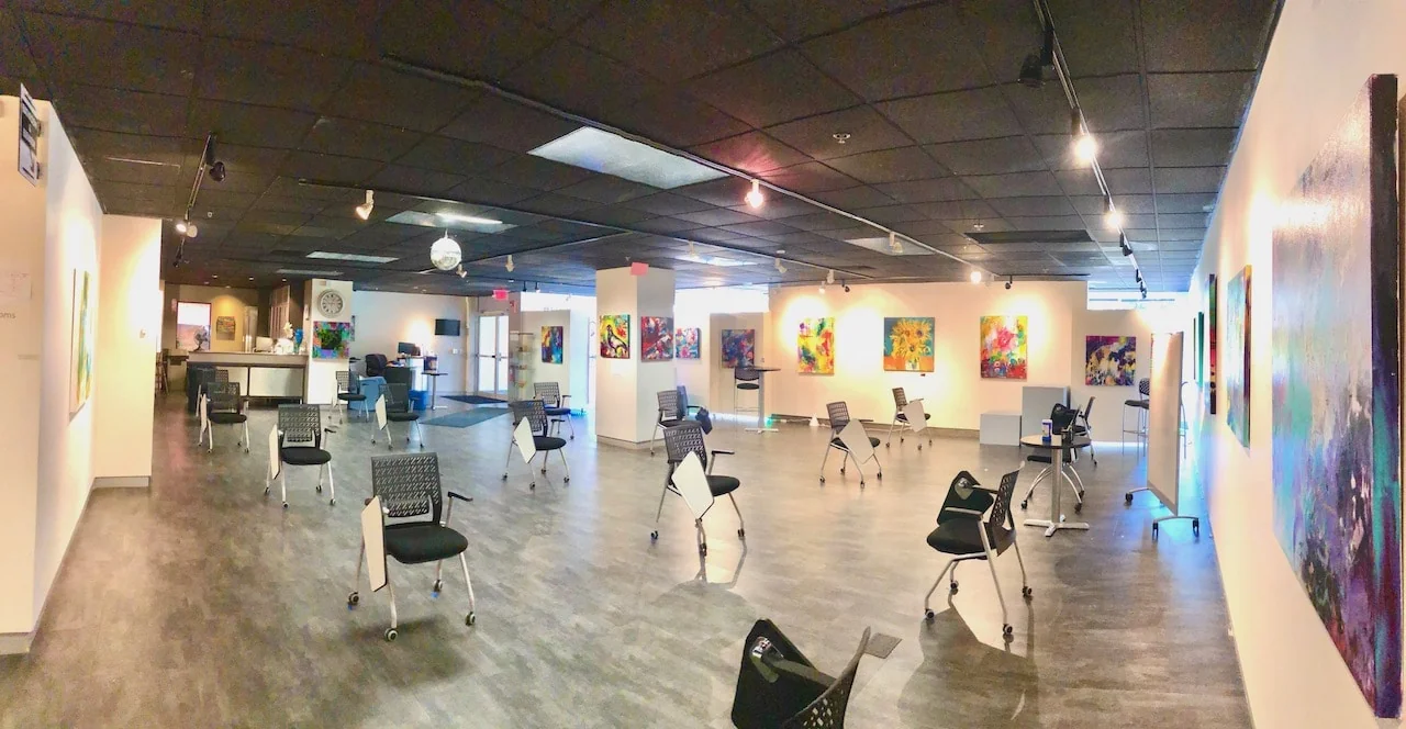 WORK_SPACE Manchester - art gallery-style coworking with colorful paintings on walls